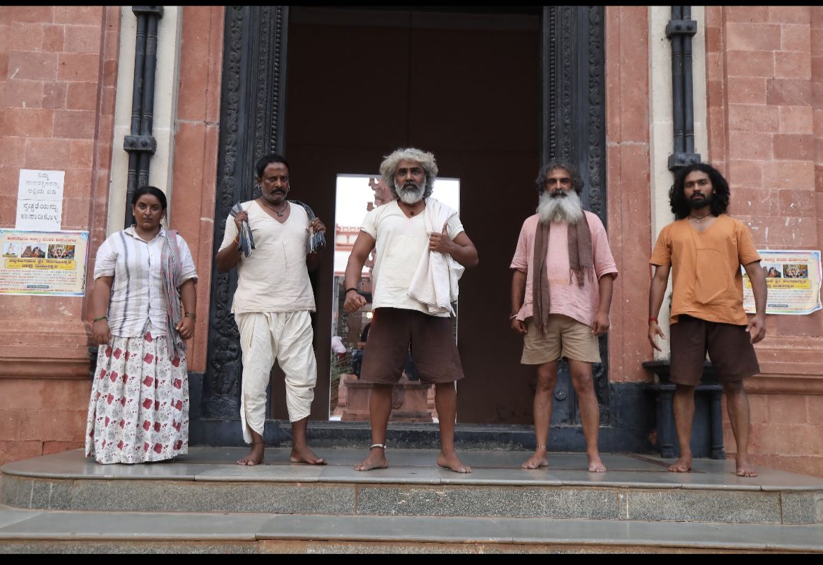 Promotional image for the Kannada movie 'Gangs of UK' featuring lead actors and title