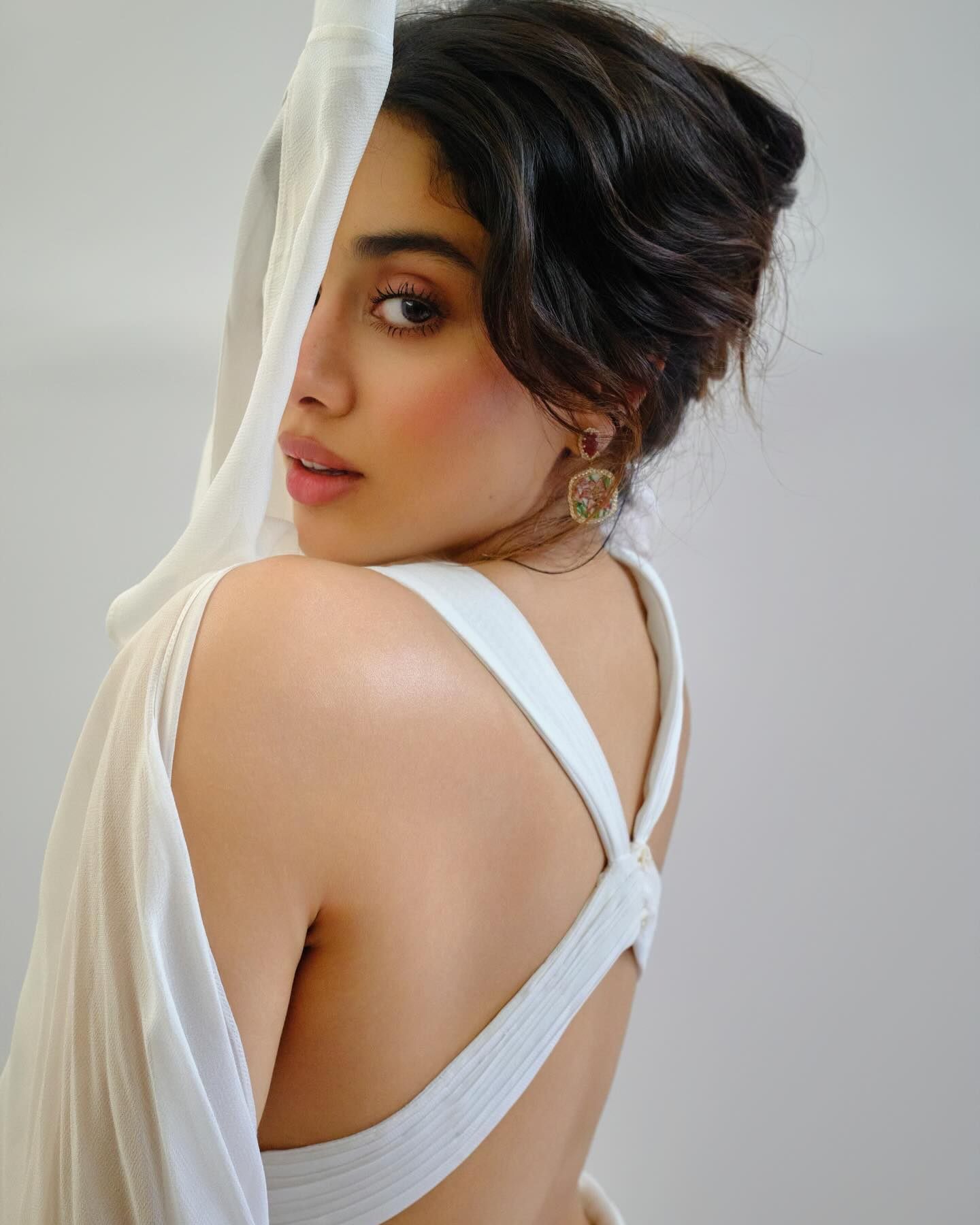 Janhvi Kapoor looking stunning in an ethereal white gown