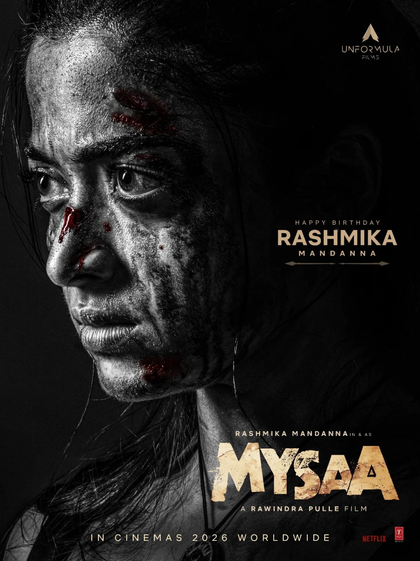 Rashmika Mandanna's birthday poster for Mysaa movie, showing her in a powerful, intense look, celebrating her upcoming role with 'rage'.