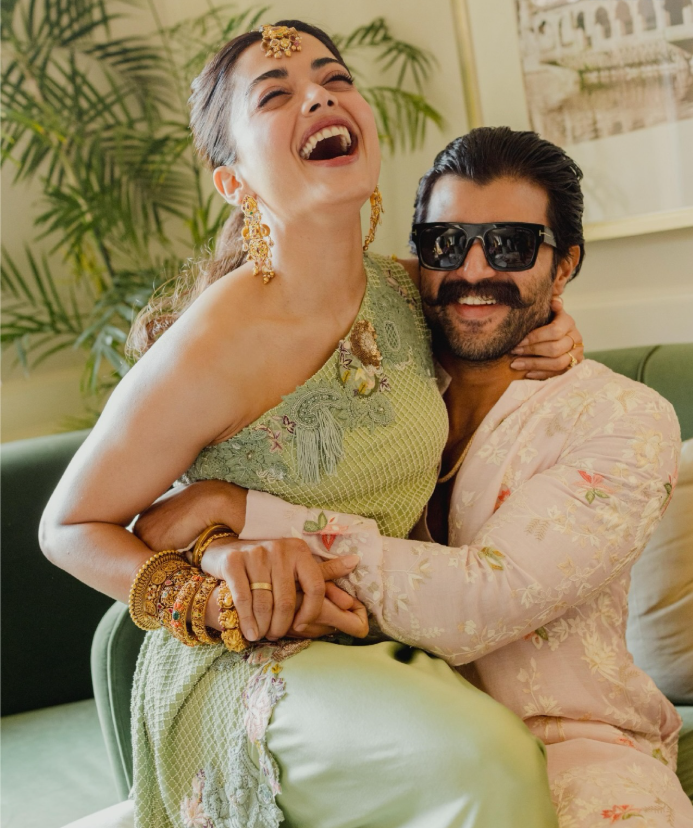 Rashmika Mandanna's social media post sparking pregnancy rumors, with text 'Now it's us three'